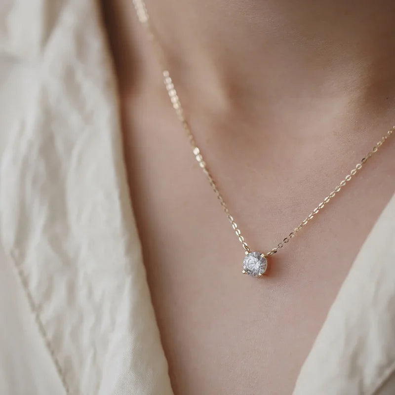 Collier pendentif zircon solitaire doré