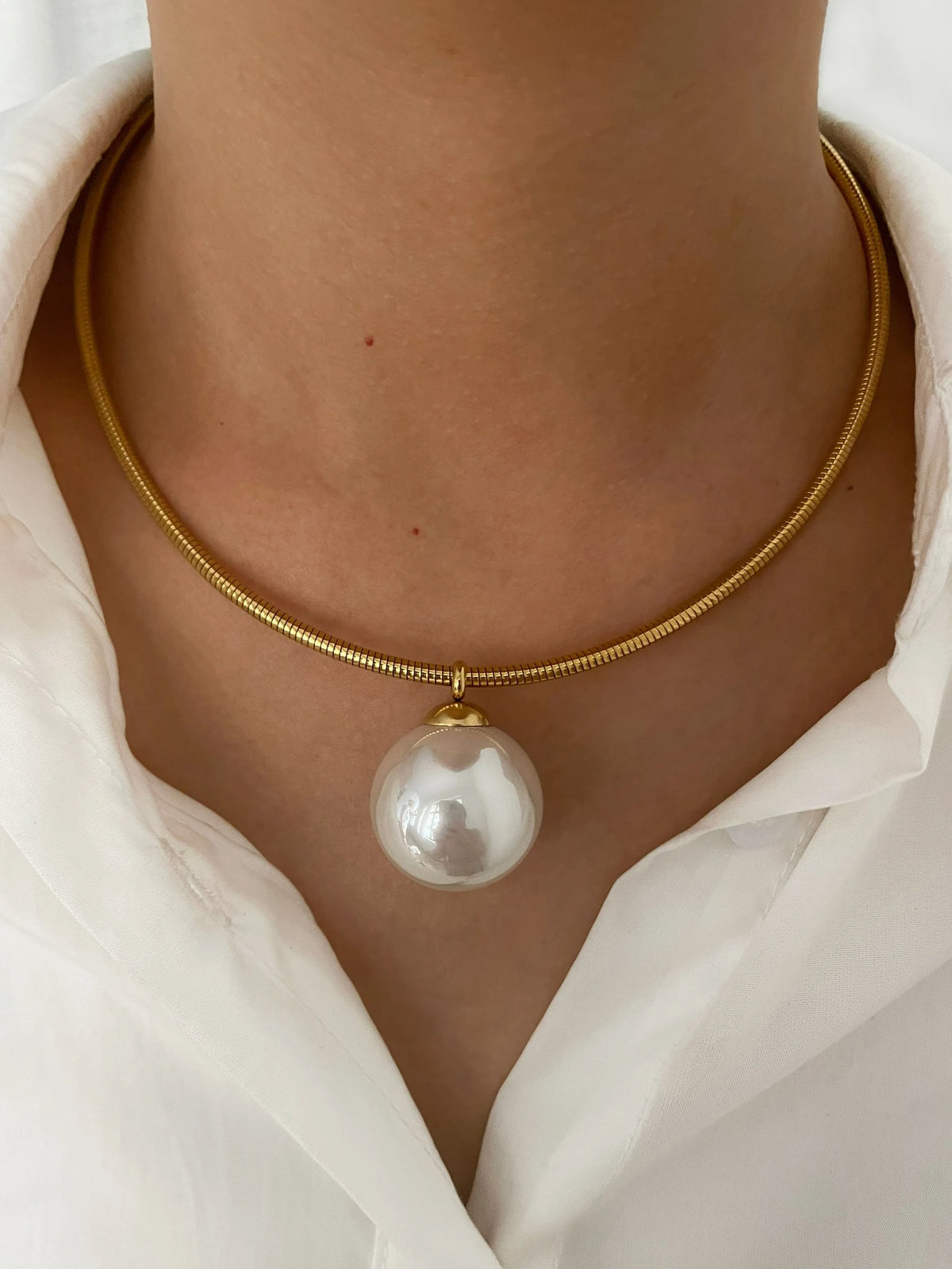 Collier perle boule doré