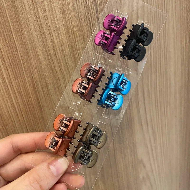 Set de 12 mini pinces crabe colorées