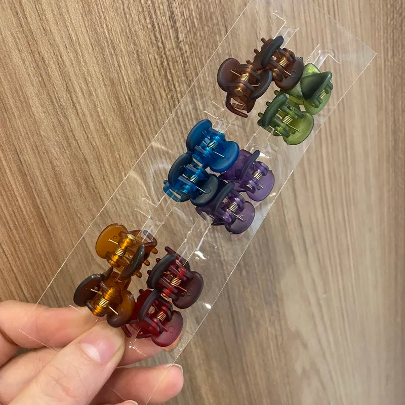 Set de 12 mini pinces crabe colorées