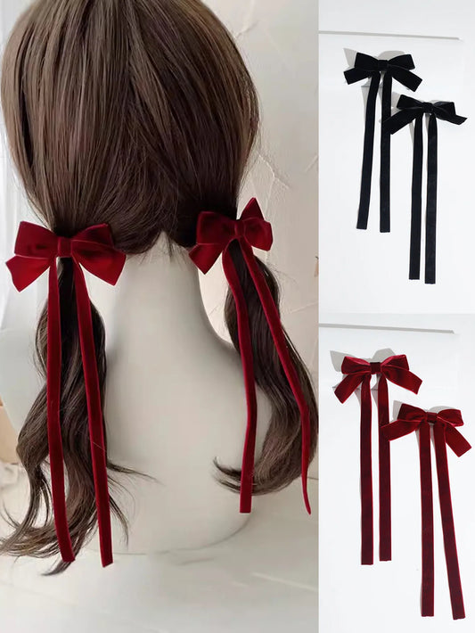 Nœuds à cheveux en velours rouge et noir, portés sur mannequin et présentés à plat