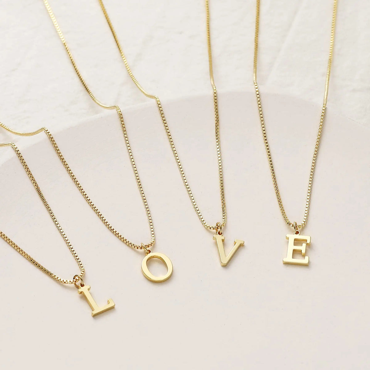 Collier initiale personnalisée doré