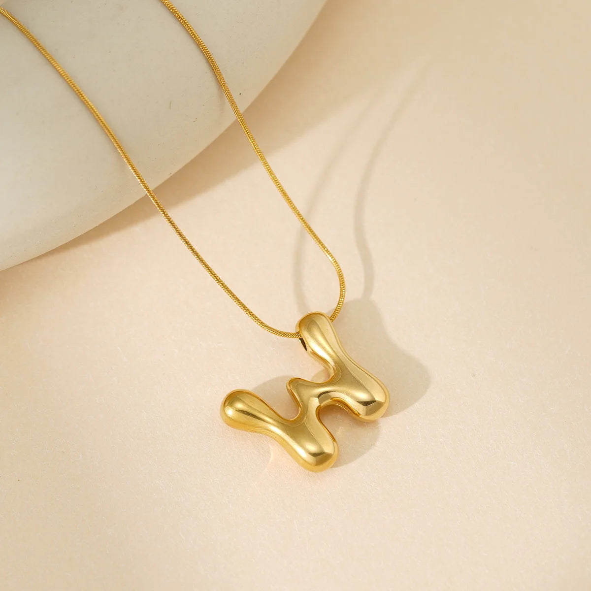 Collier lettre bubble personnalisée doré