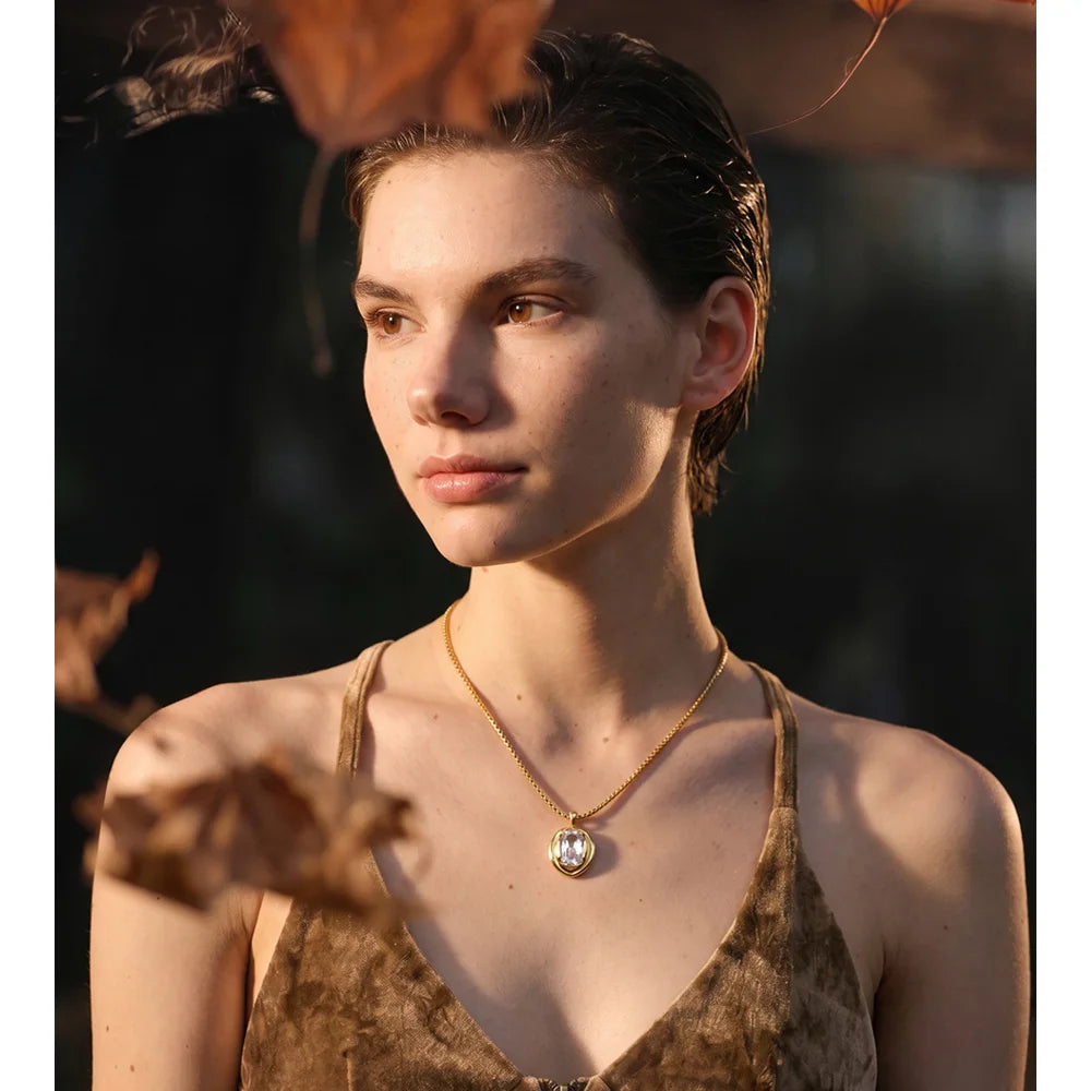 Collier pendentif cristal doré