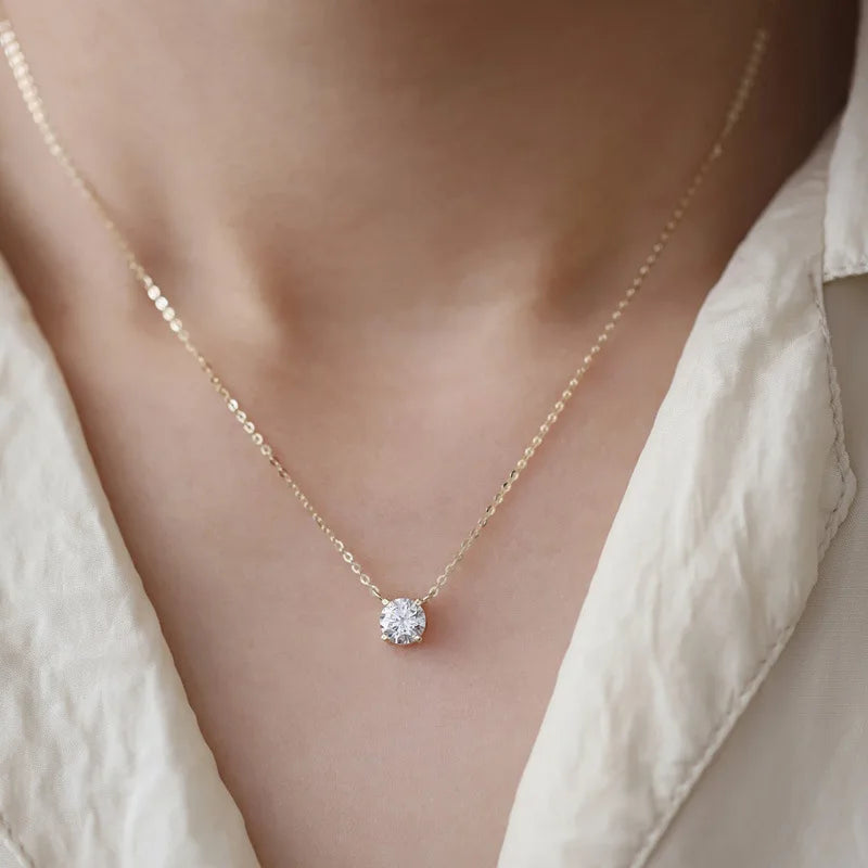 Collier pendentif zircon solitaire doré