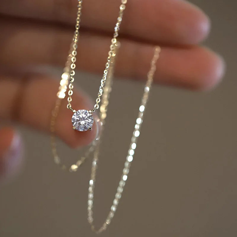 Collier pendentif zircon solitaire doré
