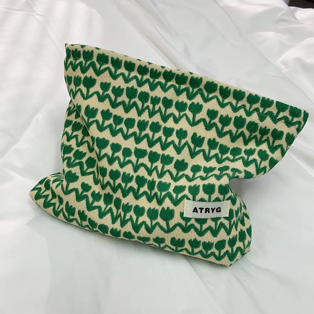 Trousse cosmétique aux motifs de feuilles exotiques pour l'automne