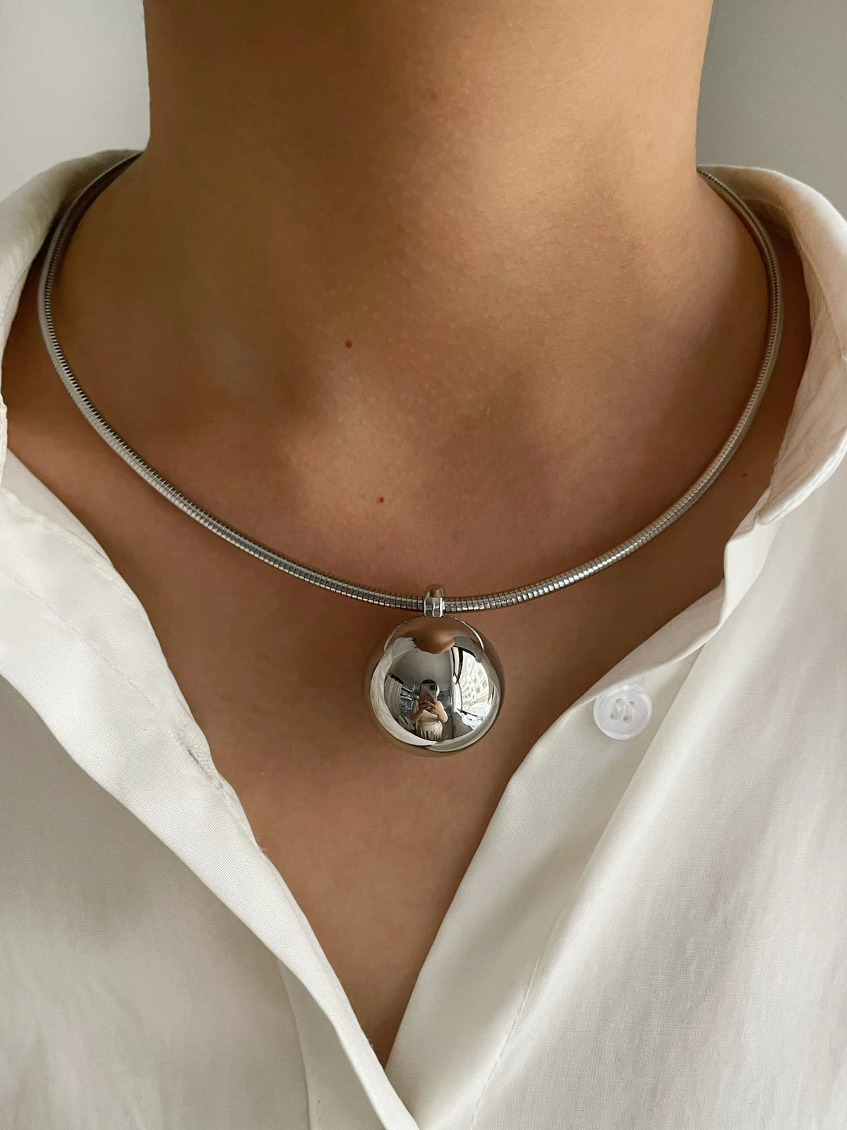 Collier perle boule doré