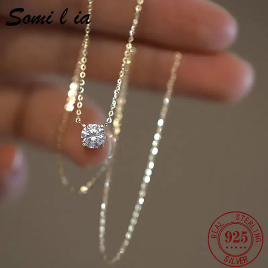 Collier pendentif zircon solitaire doré