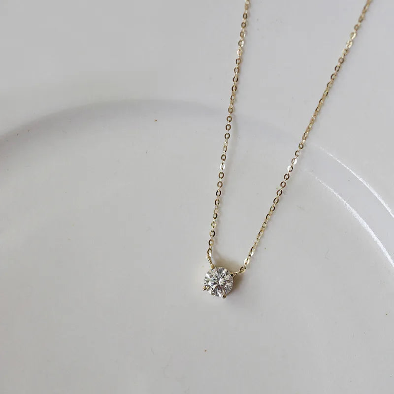 Collier pendentif zircon solitaire doré